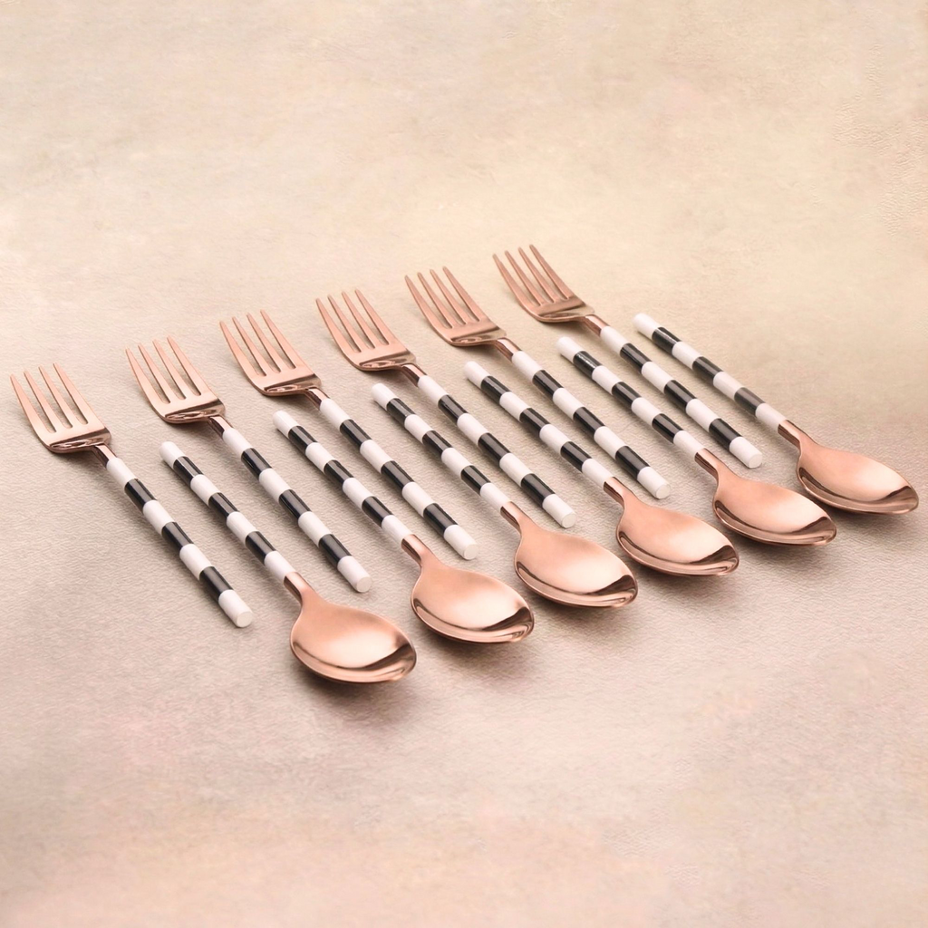 Black and white rose gold dinner cutlery set with striped handles
