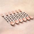 Black and white rose gold dinner cutlery set with striped handles
