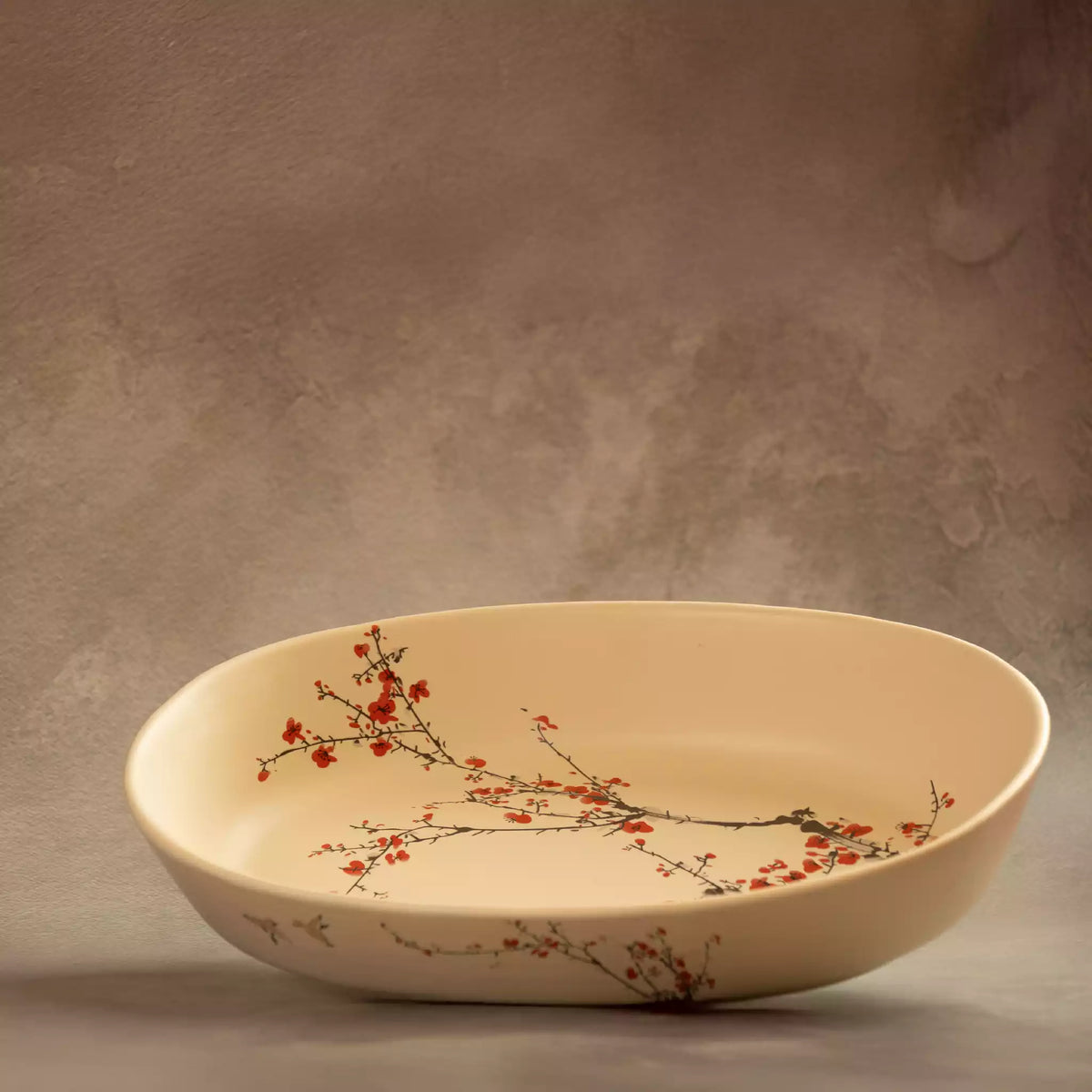 Sakura baking dish interior showing red cherry blossom painting