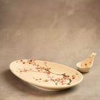 Sakura leaf platter angled view with ceramic spoon rest