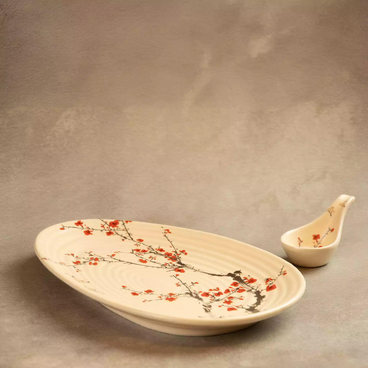 Sakura leaf platter angled view with ceramic spoon rest