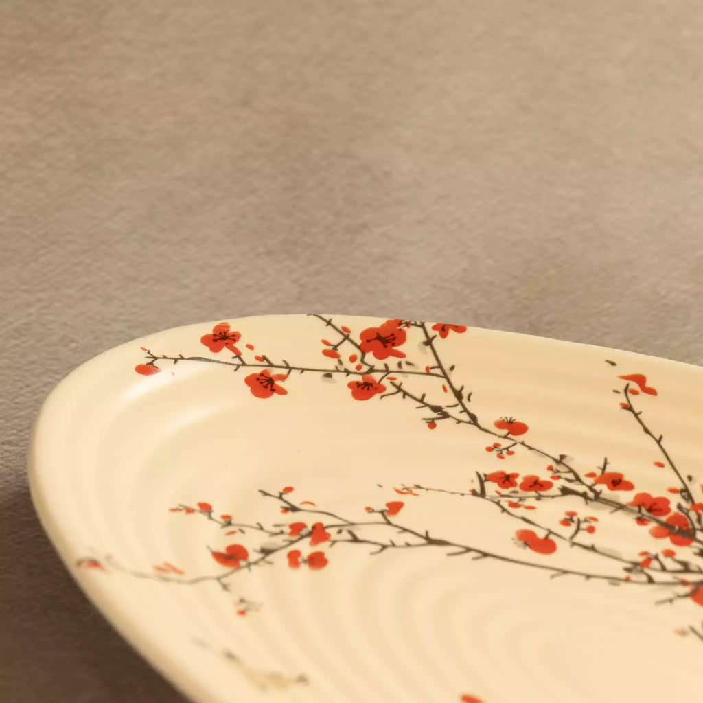 Sakura leaf platter close-up showing ribbed texture and blossoms