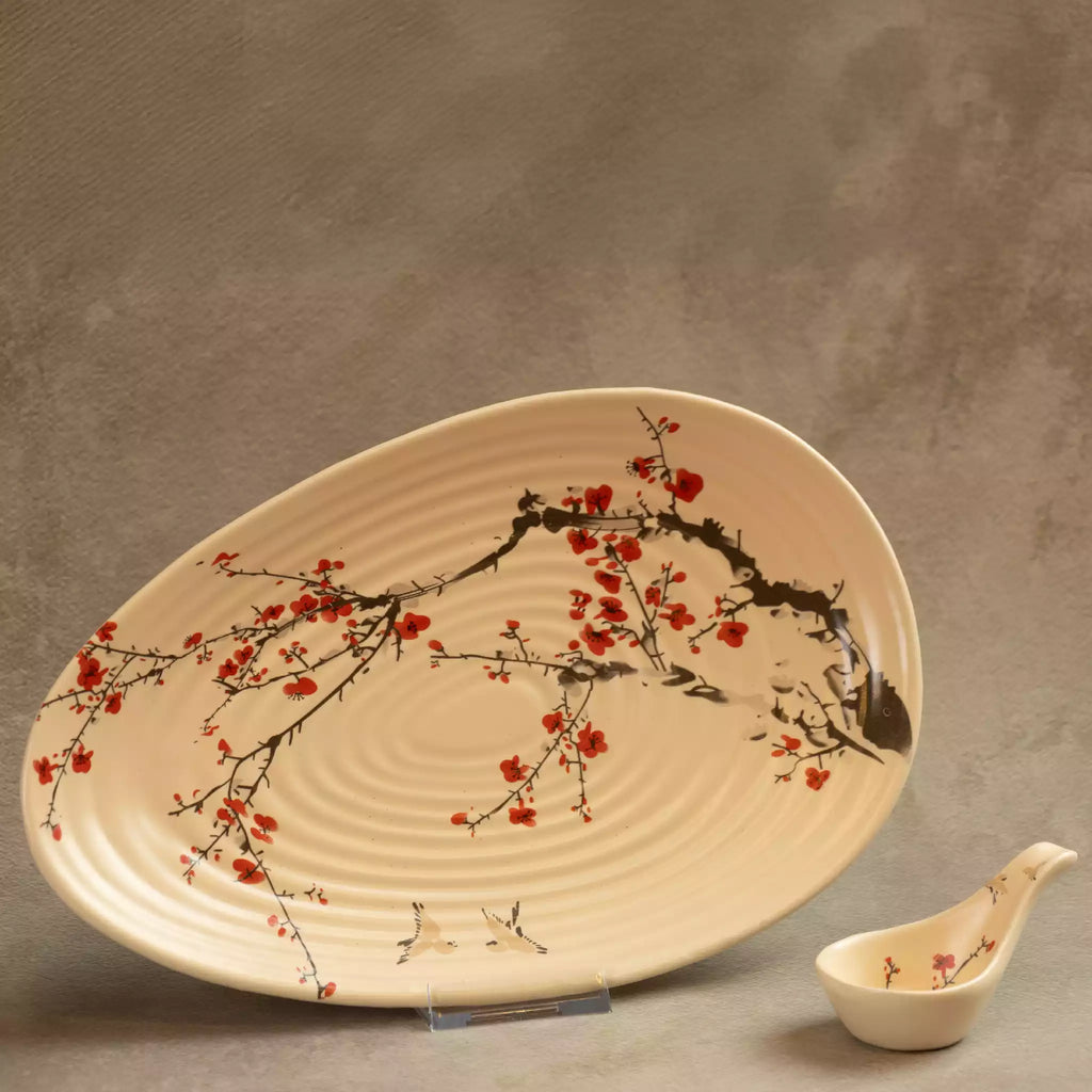 Sakura leaf-shaped serving platter with hand-painted blossom branch