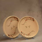 Two Sakura side plates with hand-painted cherry blossom branches