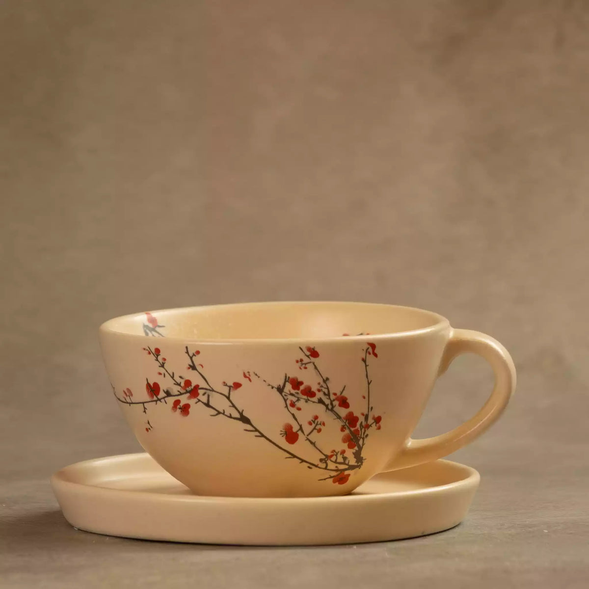 Wide Sakura tea cup on saucer with hand-painted cherry blossom design