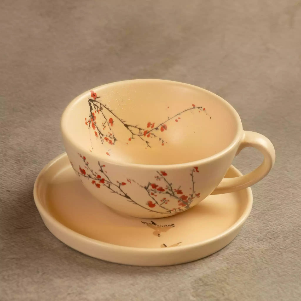 Sakura tea cup on saucer with hand-painted cherry blossom branch