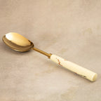 Sakura brass serving spoon with white blossom-painted handle