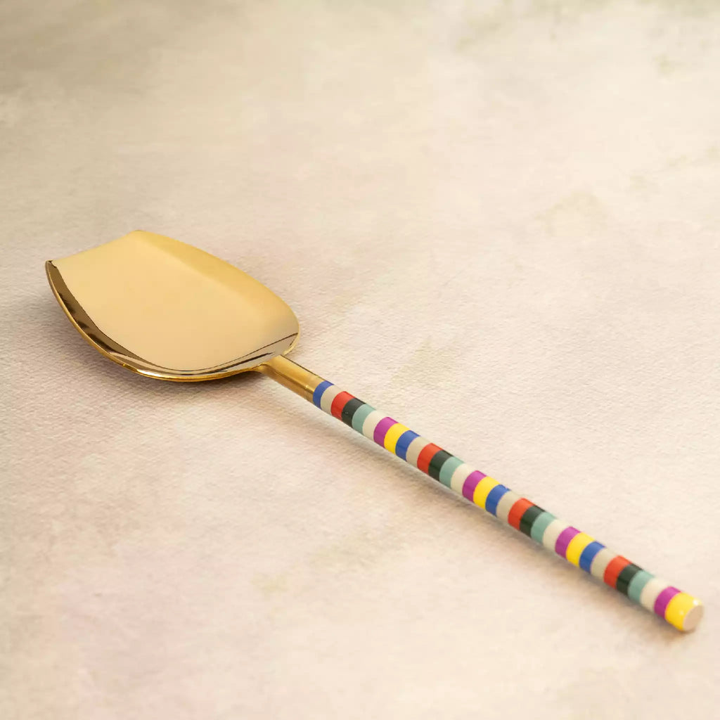 Rainbow brass flat server with multicolour beaded handle