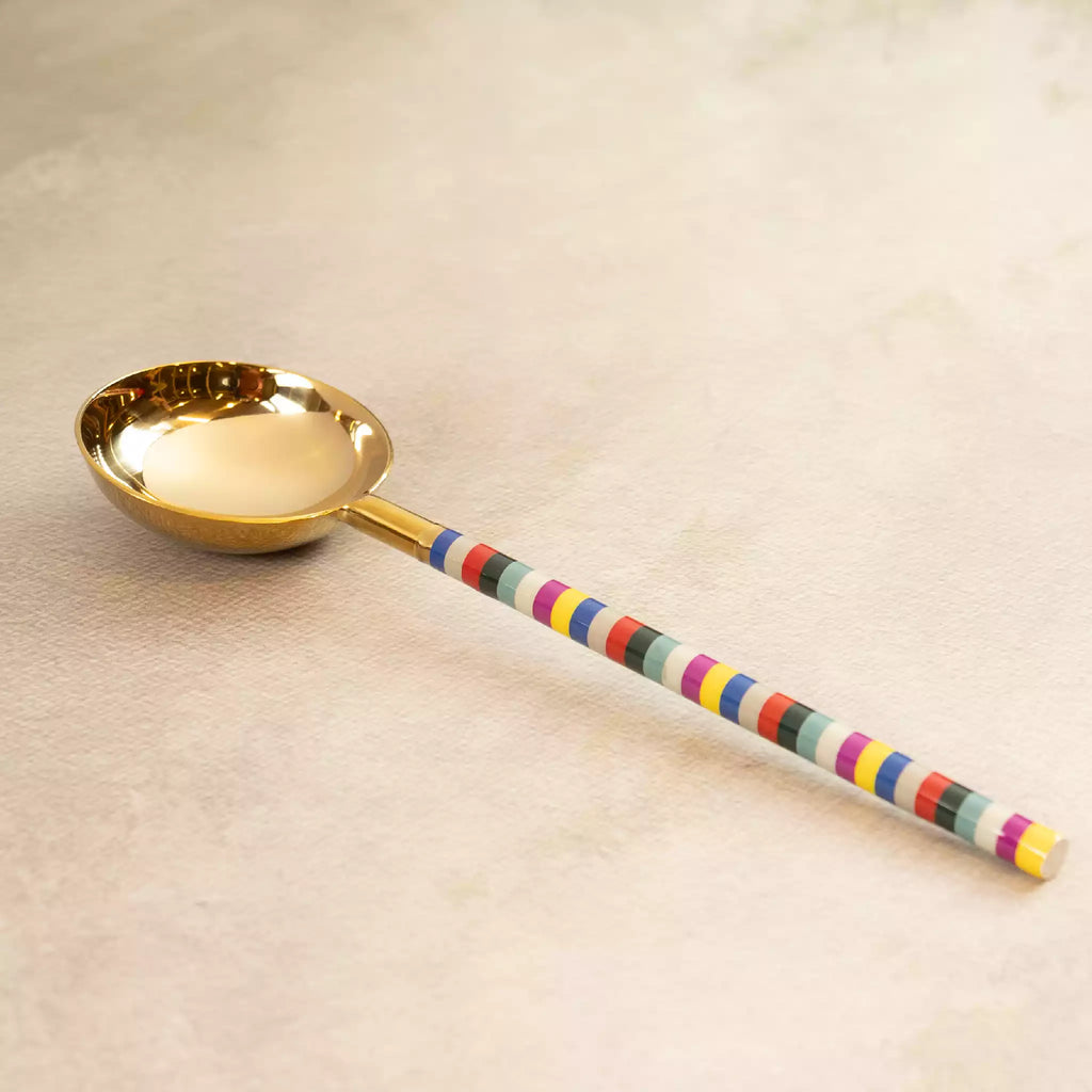 Rainbow gold ladle with colourful striped handle