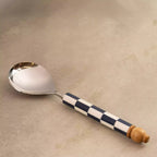 Blue checkers serving spoon upright with wooden end knob