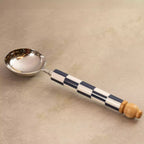 Blue checkers ladle with navy and white checkerboard handle