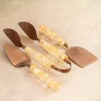 Gold dust tongs and spatulas trio with textured resin handles