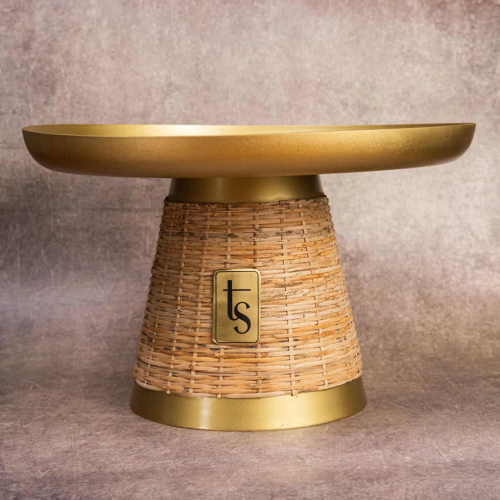 Wicker cake stand with wide gold metal top