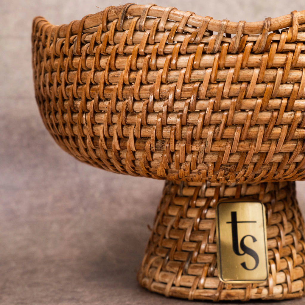Cane fruit bowl woven texture close-up with logo