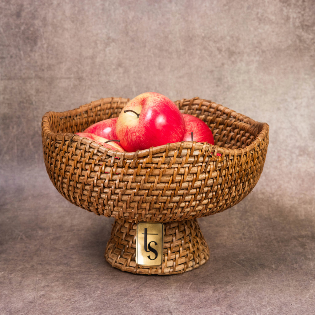 Cane fruit bowl with apples, scalloped woven rim